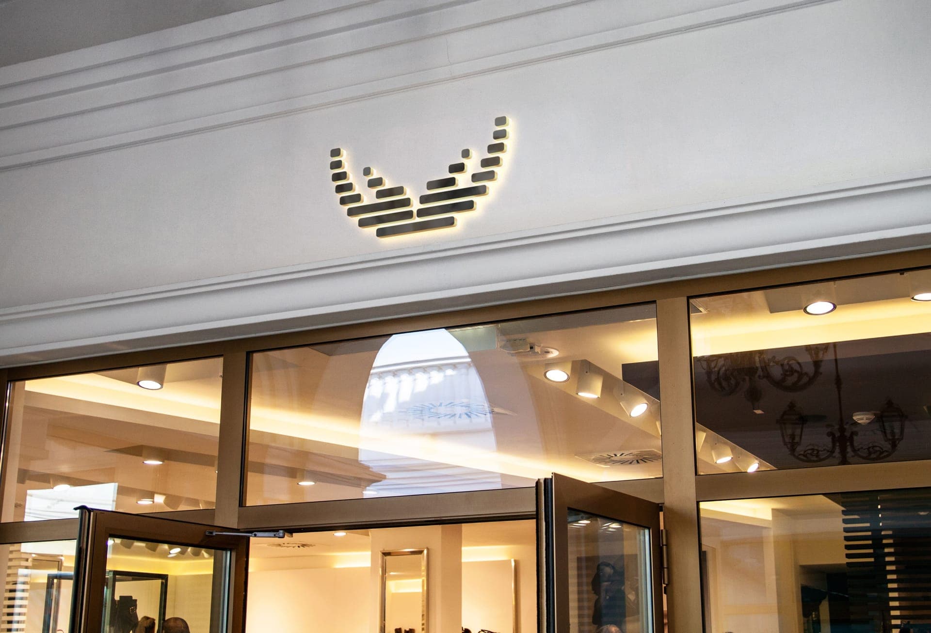 SamariTek logo on a modern retail shop facade